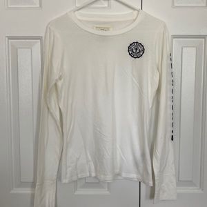 White long sleeve shirt with blue A&F emblem.